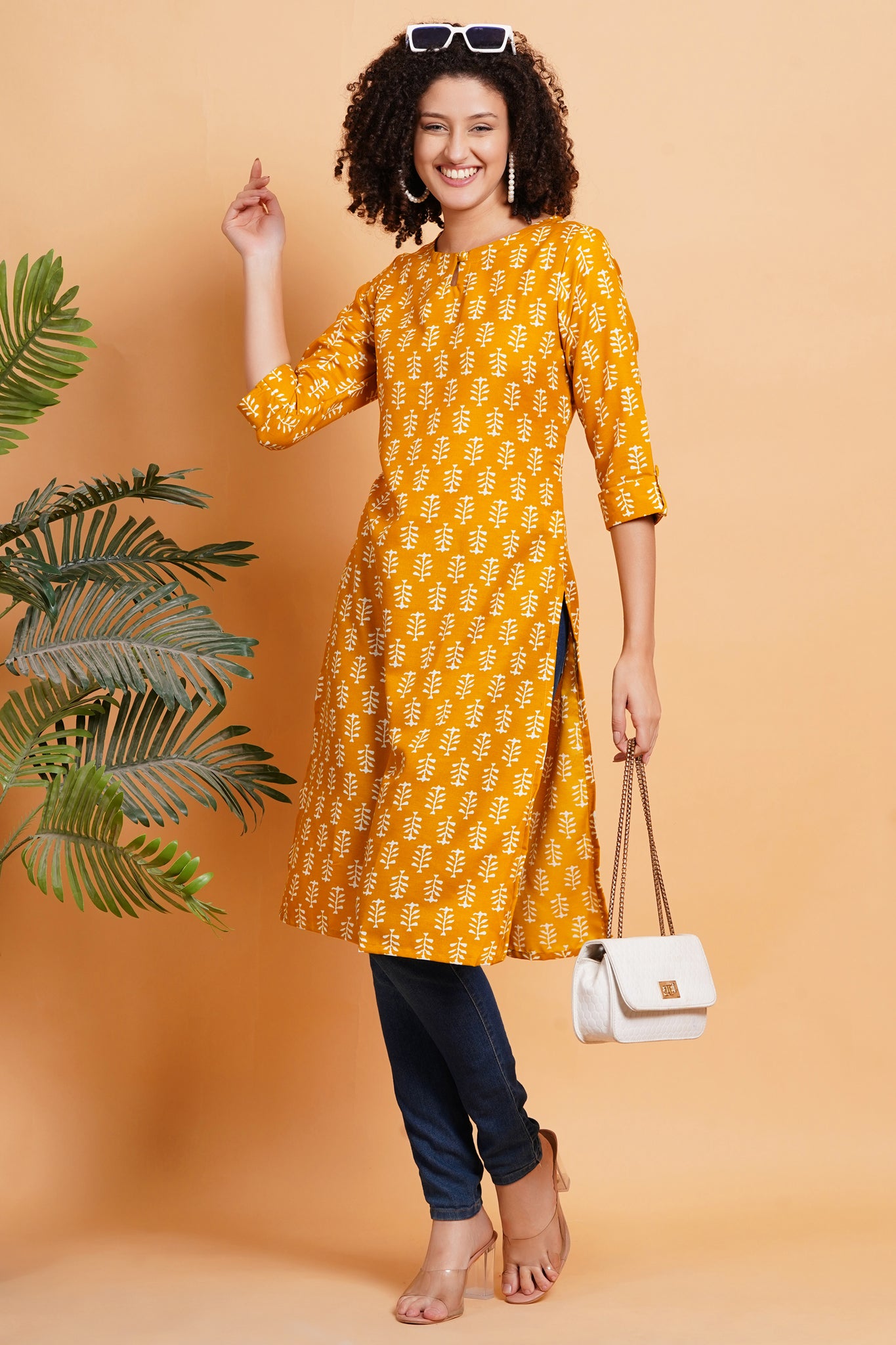 "Mustard  yellow with white motifs kurti"
